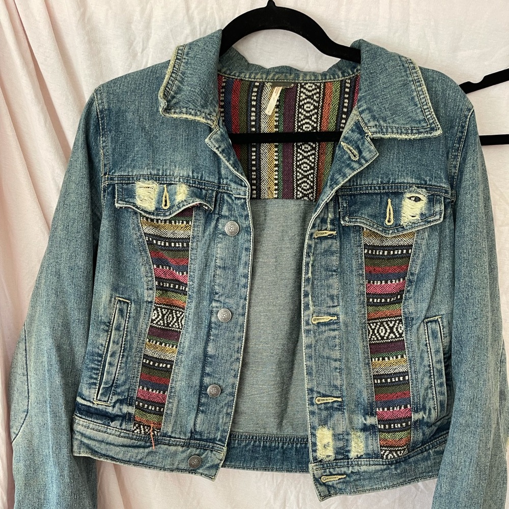 Free People distressed jean jacket size 4